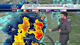 Scattered storms moving out tonight, windy Thursday