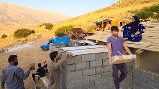 Amir's family helps tiling the bathroom ceiling of Milad and Mahin's house