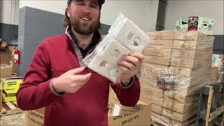 Unboxing a Pallet of Unclaimed Mail