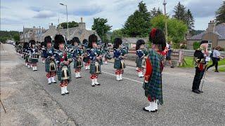 Ballater Pipe Band playing Wings on the march into Tomintoul before 2024 Tomintoul Highland Games