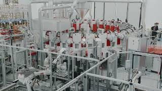 Shoe factory - STEMMA Automated conveyor line and polyurethane direct injection machine