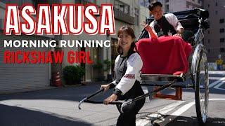 Cute japanese girl riding a rickshaw in Asakusa in the morning