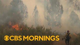 Massive wildfires in southern California reach residential areas