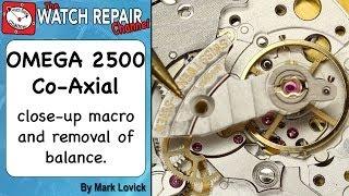 Omega Co-Axial 2500 watch close up and removal of balance