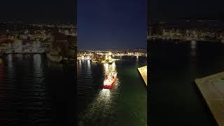 Ship arrival at Port of Piraeus night view