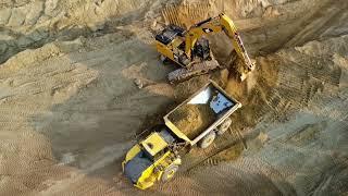 Backhoe loading Dumptruck super easy!!!