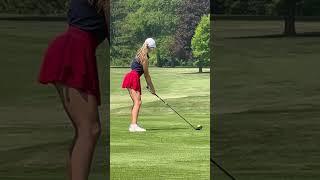 Golfers golfing