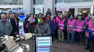 Pink-Vested ‘Rapid Response Choir’ Sings To Protest DOGE’s Cuts