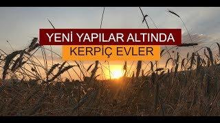 YENİ YAPILAR ALTINDA KERPİÇ EVLER