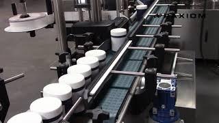 WeighPack Systems container jar bottle filling packaging machine weigh filling containers capping