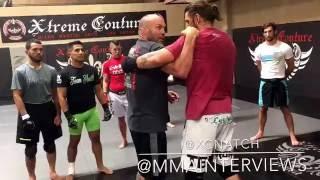 Randy Couture showing some clinch technique at Xtreme Couture for the pro practice