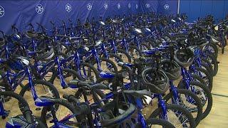 The Pro's Closet teams up with Wish for Wheels to give bikes, helmets to Aurora second graders