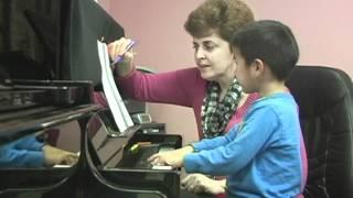 Teaching with "Tales of a Musical Journey". First Staccato lessons.