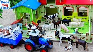 Farm Animal Toys and Barn Playset in the sandbox