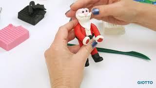 A miniature Santa Claus.