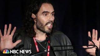 Russell Brand postpones tour, denies accusations of sexual assault