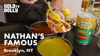 Watch Nathan's Famous Hot Dogs Cook Up Their Signature Chili Cheese Dog