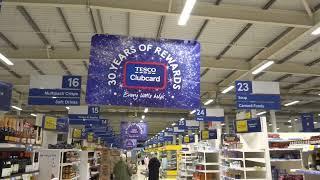 Every little breeze helps this sign to swing in a Ryde supermarket Isle of Wight IOW England 22.2.25