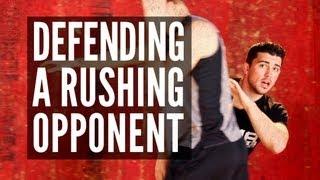 Defending a Rushing Opponent (Defense Techniques) | MMA SURGE