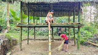 Homeless boy and girl are finishing the floor of their new house - Homeless Boy