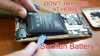 How to Repair a Swollen Battery | DON'T TRY THIS AT HOME!