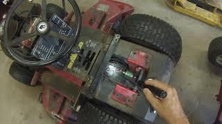 Converting a lawn mower from a mechanical fuel pump to an electric fuel pump.