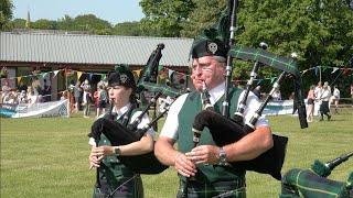 Huntly Pipe Band playing Dawning of the Day at 2023 Oldmeldrum Highland Games in Scotland