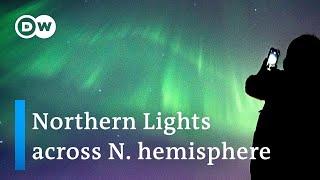 Rare solar storm brings aurora borealis to night sky | DW News