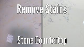 Removing stains and cleaning a quartz stone countertop piece