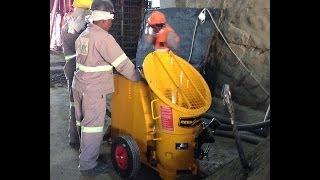 Shotcrete Concrete Wall Construction with a REED Gunite Machine