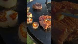 Beef fillet meets scallop Simply cut the medallion, press in the scallop a little and season