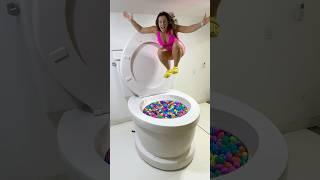 GOING UNDER and JUMPING IN the Worlds Largest Toilet Surprise Egg Pool #shorts