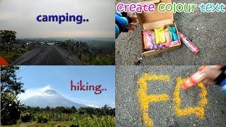 camping hiking and create colour text on sand