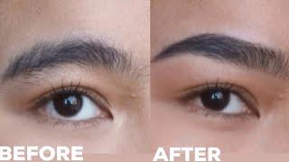 How to groom & shape your eyebrows (with tweezers)