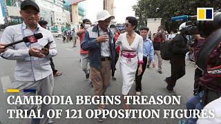 Cambodia begins treason trial of 121 opposition figures