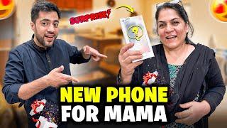 SURPRISED MAMA WITH NEW PHONE 