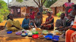 African village life/Cooking African cuisine,Roasted lemon herbs beef stew with vegetables and ugali