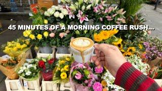 POV- Barista works a morning rush at a busy London cafe