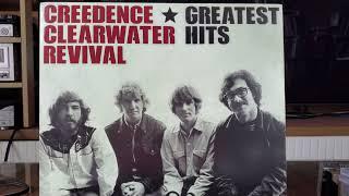 CCR Creedence Clearwater Revival - "Fortunate Son" vinyl playing 'Greatest Hits' Red vinyl