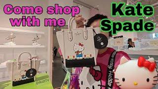 Shopping for Hello Kitty bags at Kate Spade in the U.S.