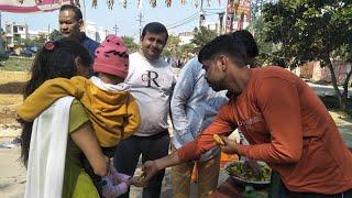 Advocate Ravi Prakash Rai, Founder Of India's Trust Pathsarthi providing prasad(Fruits) to devotees