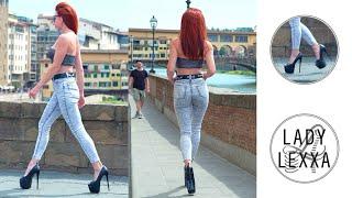 PONTE VECCHIO, FLORENCE. PUBLIC WALK IN HIGH HEELS AND JEANS.