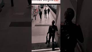 Guys walking in rubber and leather suit in a train station  #shorts