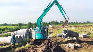 kobelco excavator, aggregate excavator, working dump truck