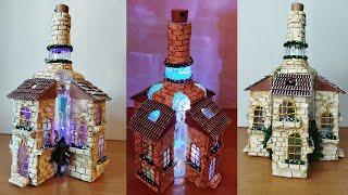 DIY Cardboard houses on a Bottle Lamp. Bottle Art idea: Christmas village