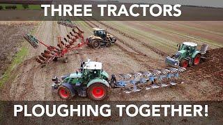 Three Tractors Ploughing Together